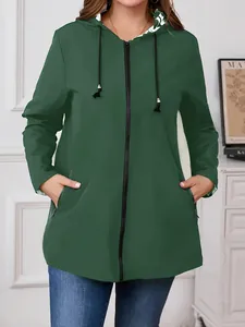 Detail view of women's dark green lightweight hooded windbreaker with full zipper