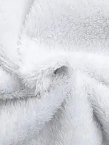 Detailed macro view of the soft white faux fur lining for women's outdoor jacket