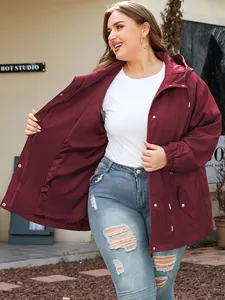 Detail of a plus-size women's burgundy outdoor waterproof windbreaker jacket