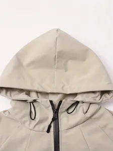Detailed view of lightweight outdoor windbreaker hood and waterproof zipper closure.