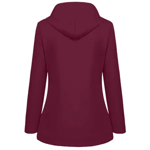 Back view of a burgundy women's hooded outdoor jacket with fleece lining for winter