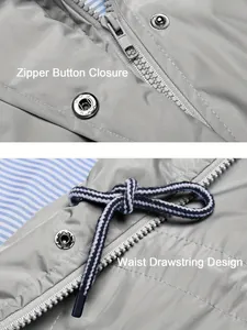 Détail de la fermeture à glissière et du cordon de serrage sur une veste imperméable