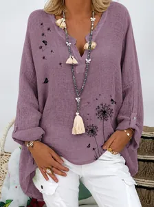 Oversized women's V-neck linen blouse in purple with black dandelion and butterfly prints.