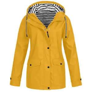Women's yellow waterproof rain jacket with striped hood lining and pockets