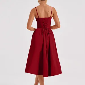 Detailed back view of a French vintage red midi dress with lace-up corset design