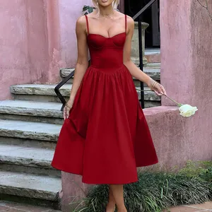 Elegant red French retro midi dress featuring a structured corset bodice and thin straps