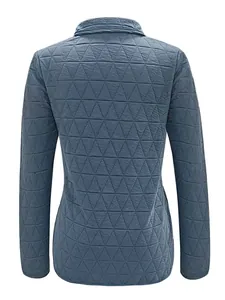 Back view of a blue women's quilted jacket featuring unique triangle pattern stitching