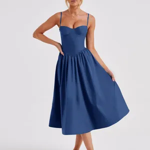 Detailed view of a French vintage blue corset midi dress featuring a pleated skirt and thin straps