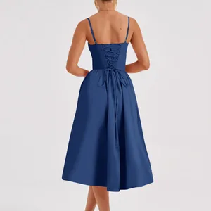 Detailed view of navy blue French vintage midi dress with elegant lace-up back design