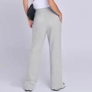 Detailansicht der Rückseite von grauen High-Waist-Jogginghosen für Damen aus Strickstoff