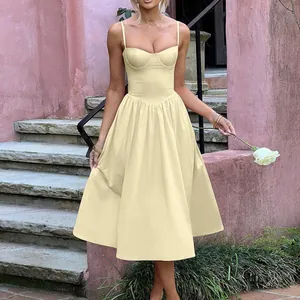 Elegant French vintage pale yellow strap midi dress with a structured bustier-style bodice
