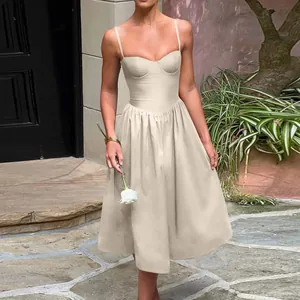 Detail of a cream French vintage midi dress with bustier bodice and spaghetti straps
