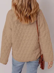 Back view of a light brown quilted cotton-padded jacket with diamond stitching detail