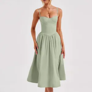 Detailed view of light green French vintage corset-style spaghetti strap midi dress