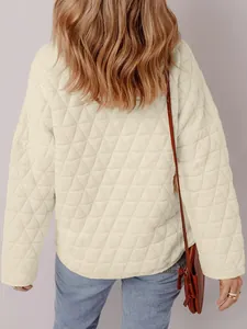 Back view of cream quilted round neck loose cotton jacket with diamond stitching