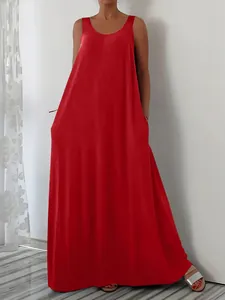 Full-length view of a vibrant red sleeveless maxi dress featuring practical side pockets