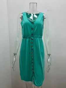 Detail view of a sleeveless turquoise V-neck button-down dress with an elastic waist