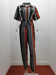 Full view of striped short sleeve jumpsuit with button-front and waist tie detail