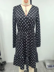 Elegant V-neck long sleeve polka dot dress with elastic waist and ruffled hem detail