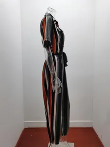 Side view of women's casual striped lapel belted jumpsuit with pockets