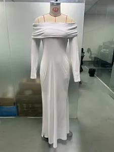 Full-length view of white off-the-shoulder long-sleeve maxi dress on mannequin