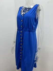 Detail view of a royal blue sleeveless button-down dress on a clear mannequin for summer