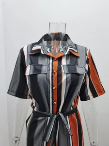 Detailed view of striped short sleeve jumpsuit featuring lapel collar and waist belt.