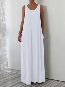 Front view of a minimalist white sleeveless maxi dress featuring side pockets and loose fit