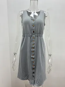 Front view of a light grey sleeveless button-down mini dress on a clear transparent mannequin.