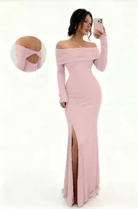Detailed view of pink off-the-shoulder maxi dress with long sleeves and front split