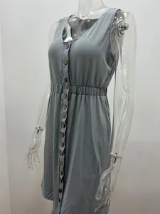 Close-up detail of a grey sleeveless summer dress featuring a button-front and elastic waist