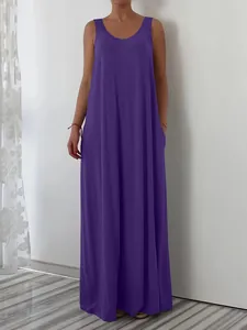 Detail view of a vibrant purple sleeveless maxi dress featuring functional side pockets.