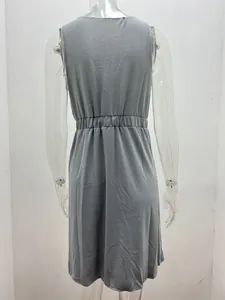 Back view of grey sleeveless mini dress with elastic waist and soft fabric details.