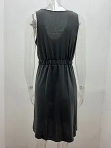 Detailed back view of a sleeveless dark grey dress featuring an elasticated waist.