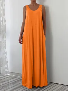 Full front view of solid orange sleeveless maxi dress with side pockets for casual summer wear