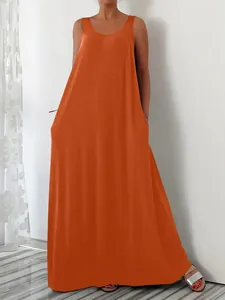Detail of orange plus size sleeveless maxi dress featuring functional side pockets