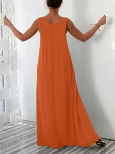 Back view of an orange solid color sleeveless casual maxi dress with a loose fit profile.