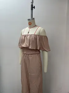 Casual two-piece set with off-shoulder ruffle top and wide-leg pants on mannequin