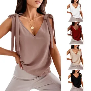 Close-up of sleeveless V-neck top showing shoulder tie details in multiple colors
