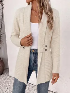 Close-up of women's casual mid-length cardigan with decorative double-breasted straps