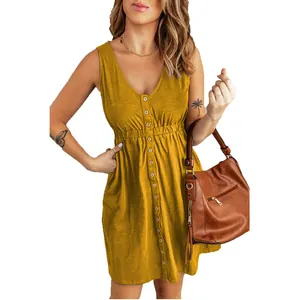 Detail shot of a yellow sleeveless button-front mini dress with a deep V-neckline