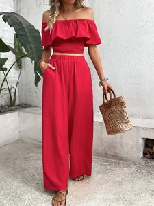 Red off-shoulder ruffled smocked crop top and wide-leg pants two-piece set detail view