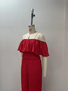 Red off-the-shoulder ruffled top and wide-leg pants set displayed on a mannequin