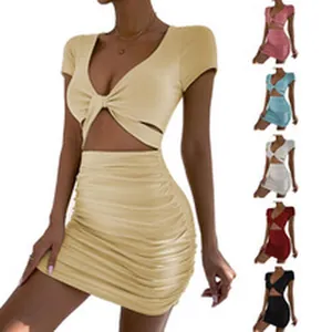 Detail view of women's sexy two-piece bodycon mini dress set with a cut-out waist design