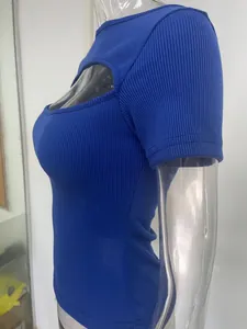 Close-up detail of a royal blue ribbed short sleeve top with a sexy chest cutout design