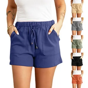 Close-up detail showing the drawstring elastic waist and side pockets of women's casual shorts