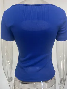 Back view of a vibrant electric blue ribbed short sleeve top shown on a clear mannequin.
