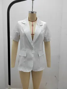 White short-sleeved women's blazer on mannequin showing fit and lapel detail
