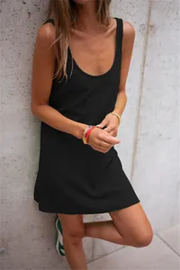 Close-up detail of a casual black sleeveless waffle knit mini tank dress for women