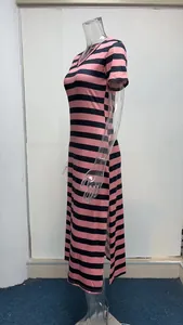 Pink and navy striped maxi dress with short sleeves and side slit detail.